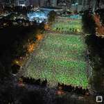 image for Thousands of Hong Kongers defy police ban to attend annual Tiananmen candlelight vigil