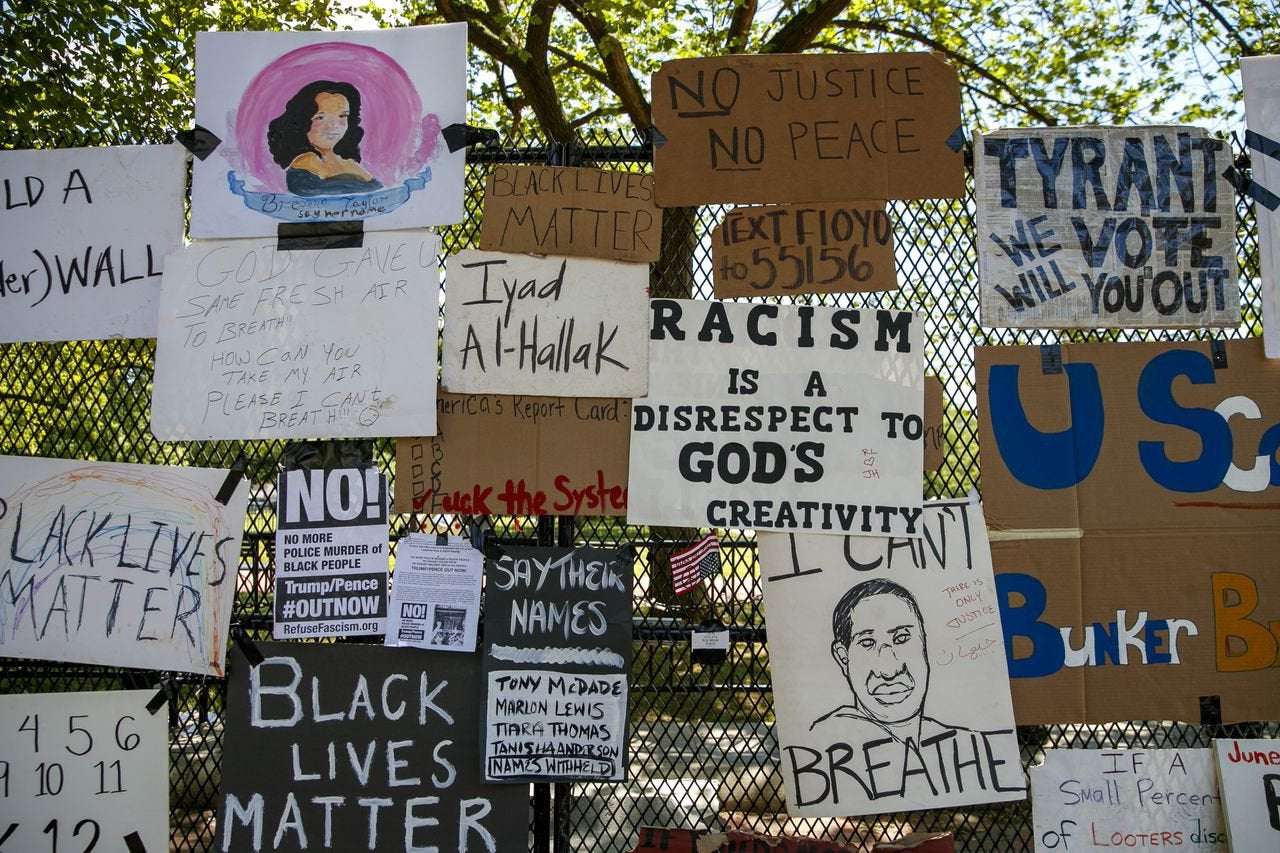 image for George Floyd protesters turn White House fence into memorial wall