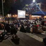 image for Capitol Hill Autonomous Zone. Educational movie night. This is seattle without militarized police. Where are your riotous looters NOW? They are watching documentaries. Fuck you SPD. Photo credit to a close friend.
