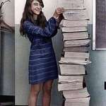 image for Margaret Hamilton standing by the code that she wrote by hand to take humanity to the moon in 1969