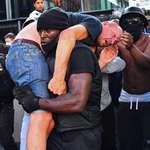 image for In London today, a BLM protestor carries a far-right counter-protestor to get medical help.