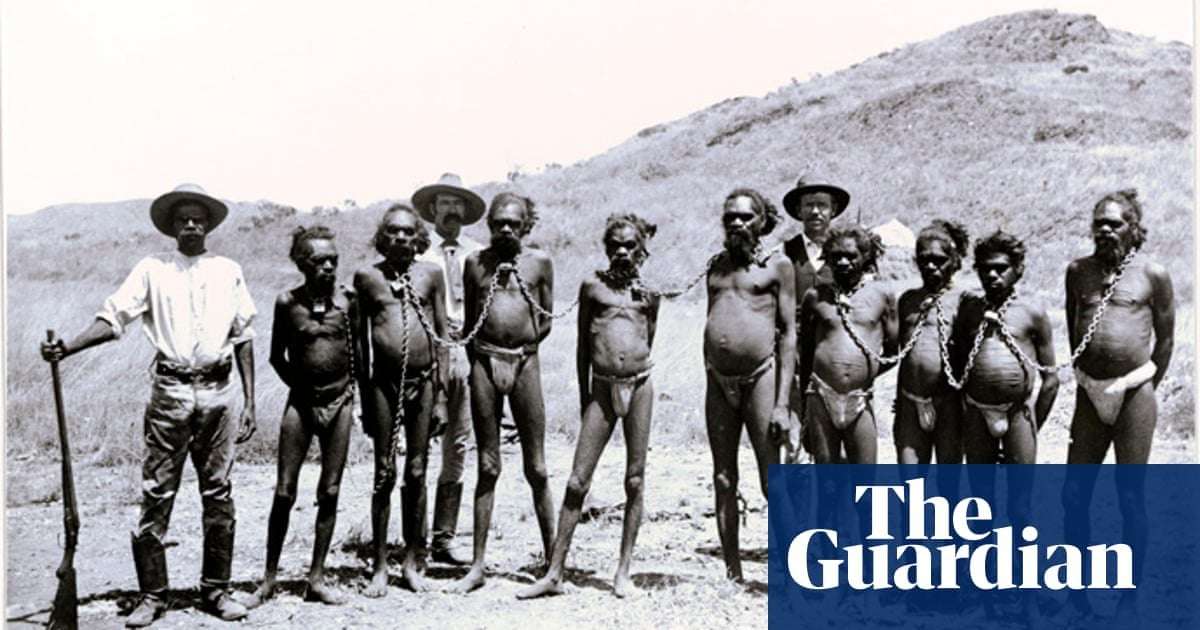 image for Facebook blocks and bans users for sharing Guardian article showing Aboriginal men in chains