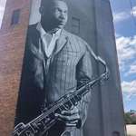 image for My brother just finished painting this giant mural of John Coltrane in his hometown of Hamlet, NC