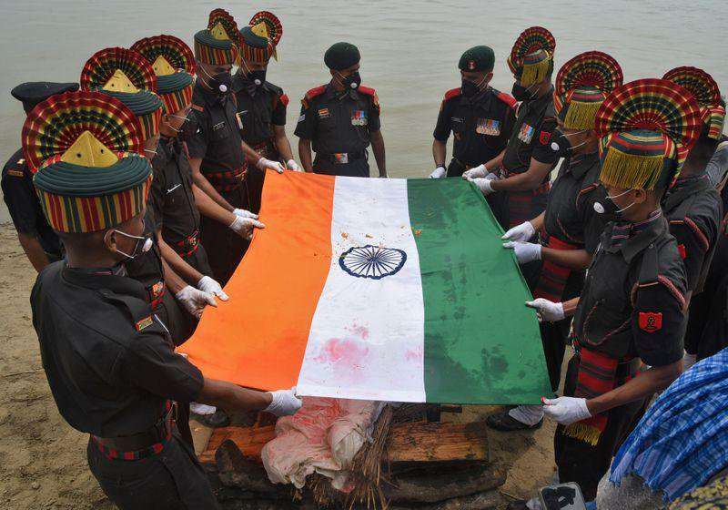 image for Indians hold funerals for soldiers killed at China border, burn portraits of Xi