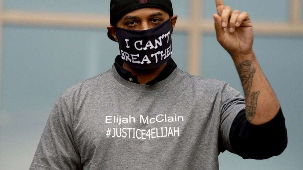image for Thousands gather in Denver to protest Elijah McClain's death