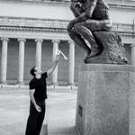image for Robin Williams offering “The Thinker” a roll of toilet paper