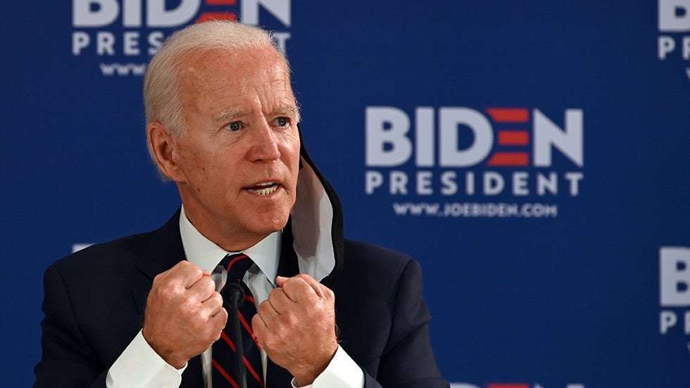 image for Biden on Trump sharing video of protester shouting 'white power': He 'has picked a side'
