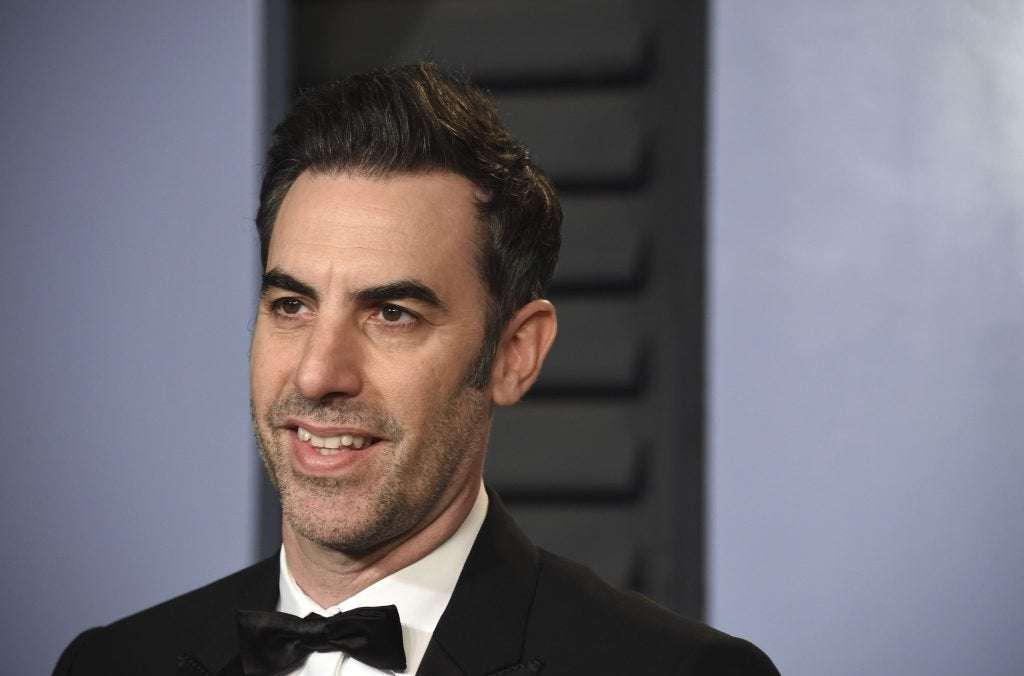image for Sacha Baron Cohen Crashes Right Wing Event, Leads Absurd Sing-Along
