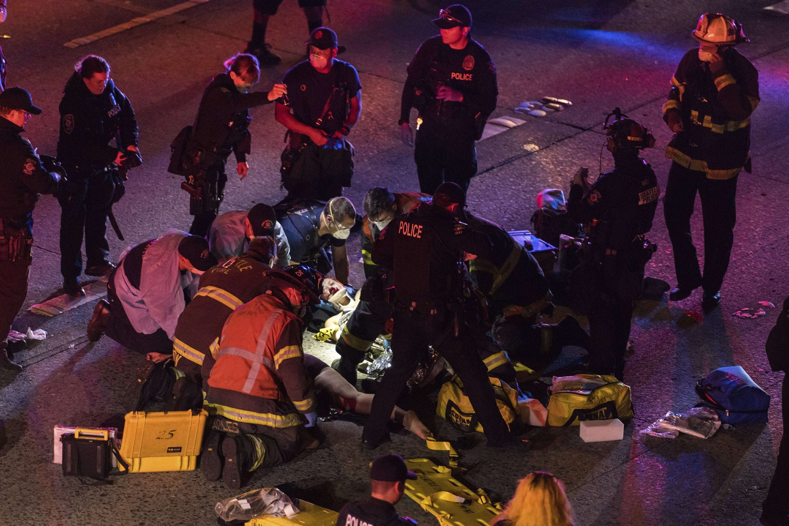 image for 1 of 2 protesters hit by driver on Seattle freeway dies