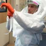 image for 74 year old Dr Fauci suiting up in 2015 to treat an Ebola patient