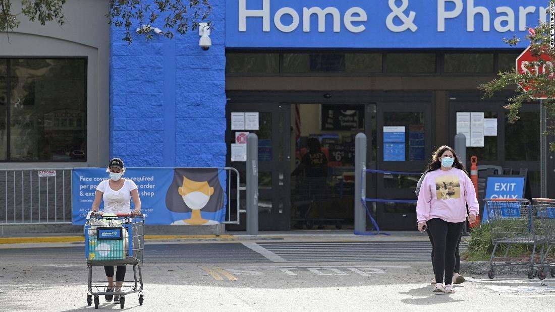 image for Walmart, Kroger will start requiring customers in US stores to wear masks