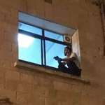 image for Palestinian woman with COVID son climbed her hospital room window every night until she passed away