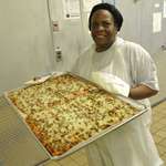image for A whole tray of school lunch pizza.