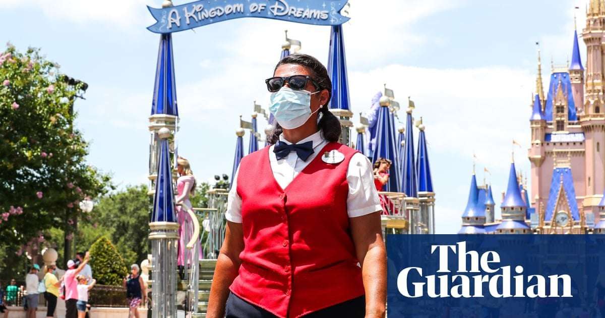 image for Disney theme park staff worry about Covid-19: 'I can't bring it back home'