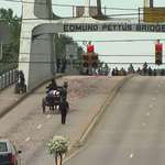 image for John Lewis crossing the bridge at Selma one last time