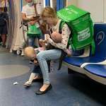 image for Young mother doing food delivery in Russia