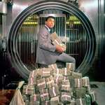image for Muhammad Ali with his winnings in 1964.