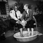 image for In 1969, black citizens weren't allowed to swim in "white-only" swimming pools. Mr. Rogers invited a black officer on his show and asked if he wanted to cool off by dipping his feet into an inflatable pool. Mr. Rogers joined him, breaking the color barrier live on television.