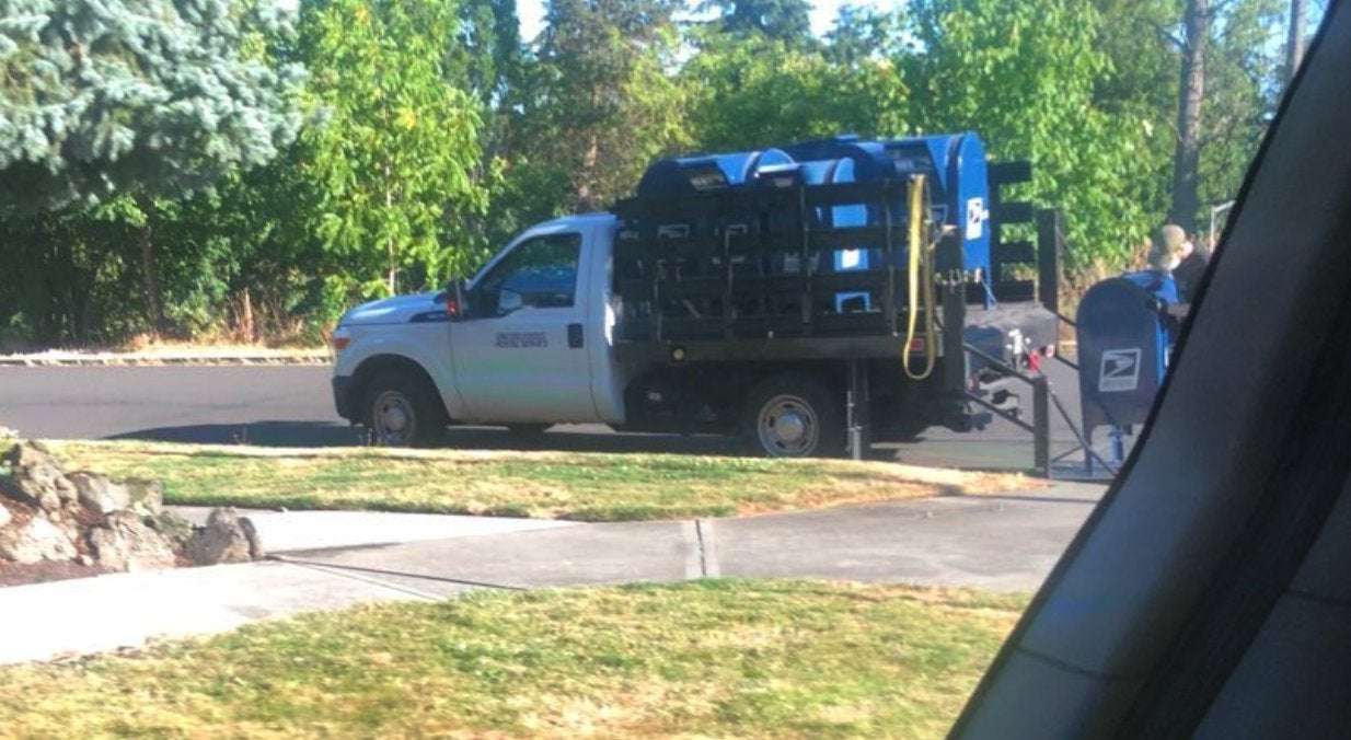 image for Postal service seen hauling mailboxes away in trucks as Trump's pick to lead USPS makes controversial changes before election
