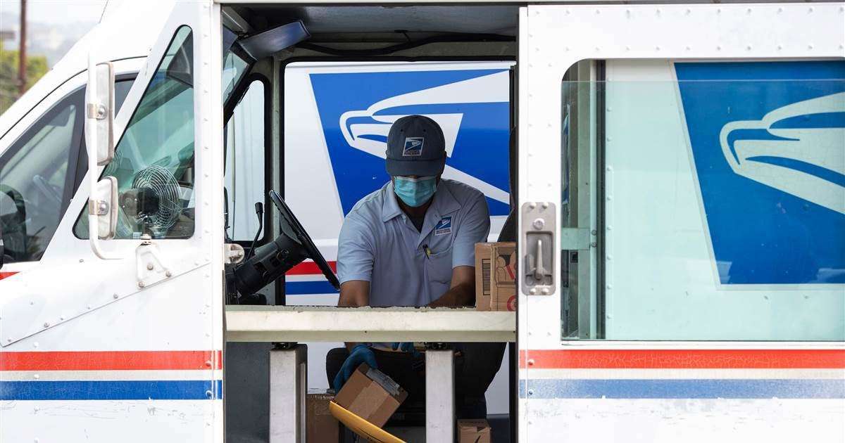 image for Postal carriers union endorses Biden, warns that 'survival' of USPS is at stake
