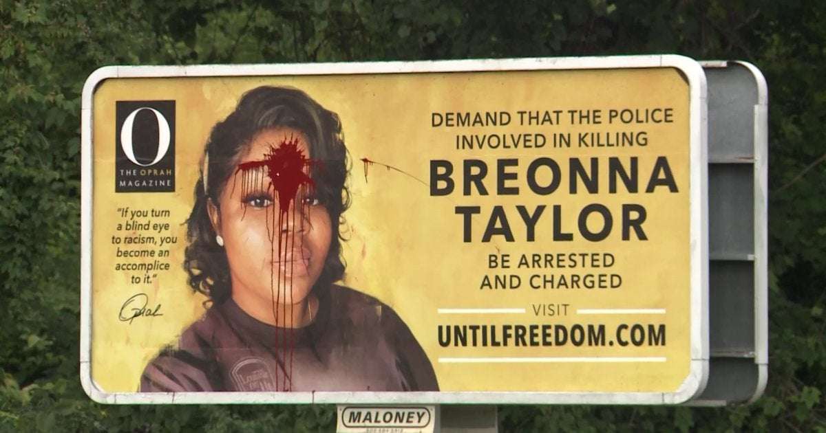 image for Breonna Taylor billboard in Kentucky vandalized with red paint splattered across her forehead