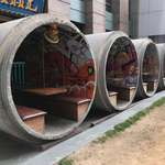 image for Concrete sewer pipes used as outdoor seating