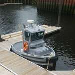 image for The smallest active-duty vessel (mini tug) of the United States Navy.