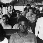image for A man rides a whites-only bus in Durban in protest of South African apartheid policies (1986).