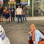 image for Muslim Woman Took A Smiling Stand Against Anti-Muslim Protesters