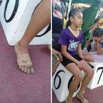 image for This is Rhea Bullos, she's 11 and couldn't afford to buy sport shoes to compete, so she covered her feet with plasters and drew Nike logo on them. And guess what, she won 3 gold medals (400, 800 and 1500m)