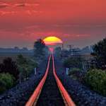 image for Raymond Cunningham waits every year for the day the sun rises just right and reflects along the railroad tracks, This happens the first week of September in Homer, Illinois!