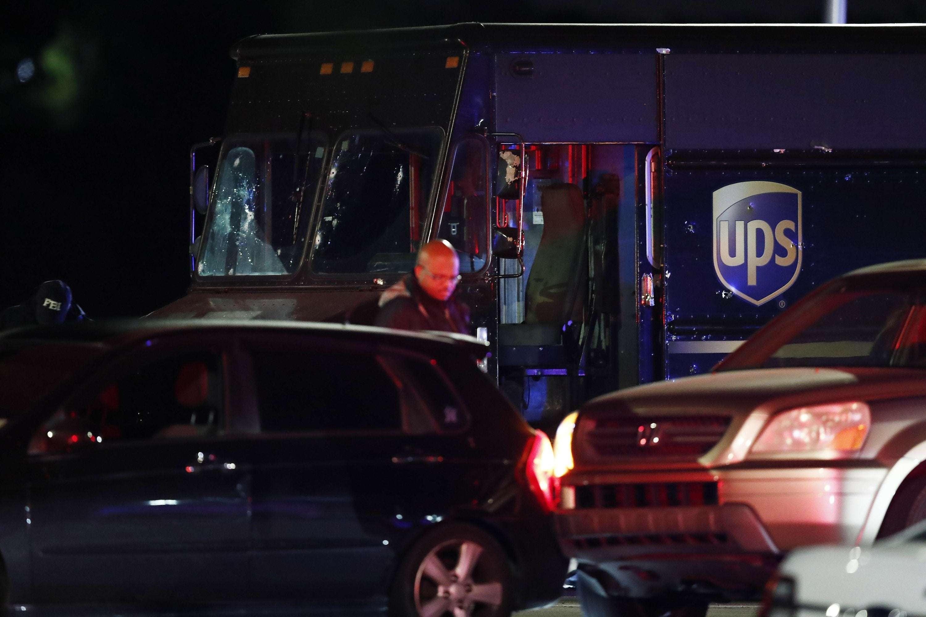 image for Family of UPS driver slain in police shootout files lawsuit