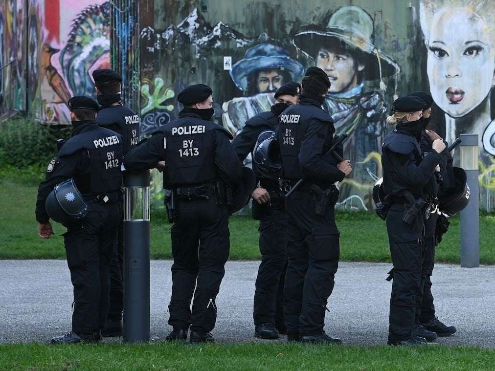 image for Mass suspension of German police officers who shared pictures of Hitler and doctored images of refugees in gas chambers