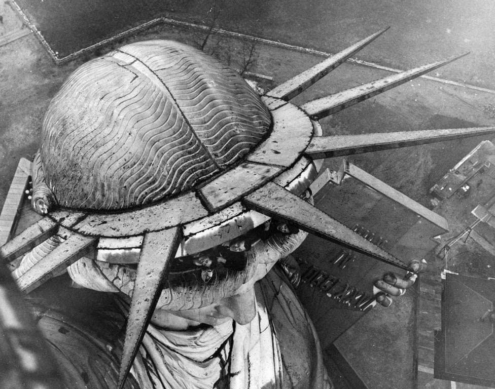 image showing A rare view of the Statue of Liberty from the balcony on its torch. The exit there has been closed since 1916.