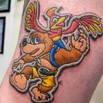 image for Patchwork style Banjo Kazooie tattoo done by Authentic Ink studio