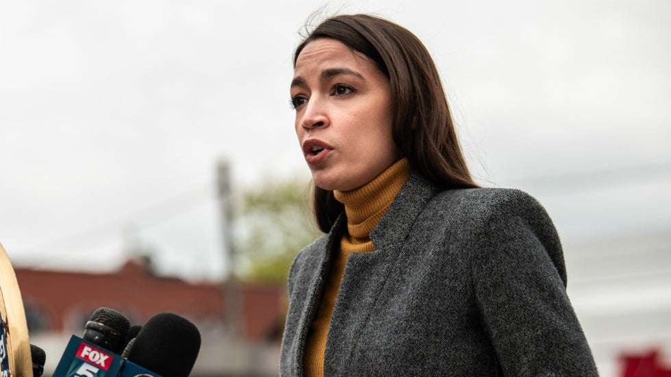 image for Ocasio-Cortez: Trump contributed less in taxes 'than waitresses and undocumented immigrants'