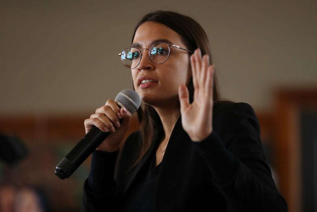 image for AOC Says She Woke Up to Stacks of Photos From FBI Showing 'People Who Want to Kill' Her