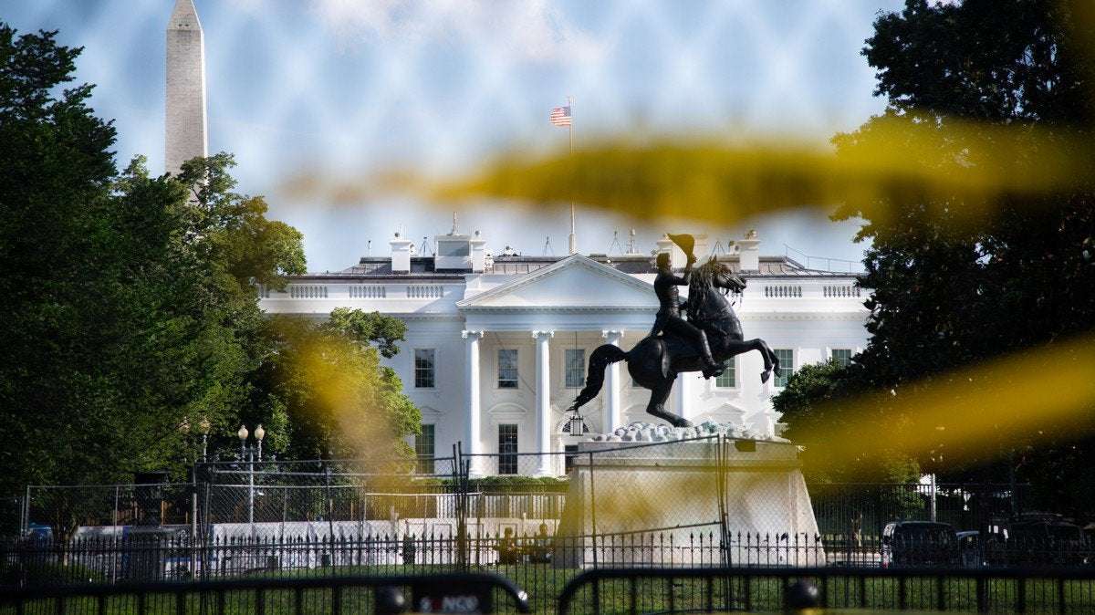 image for Trump Is Barricading Himself Behind a Massive 'Non-Scalable' Fence on Election Day