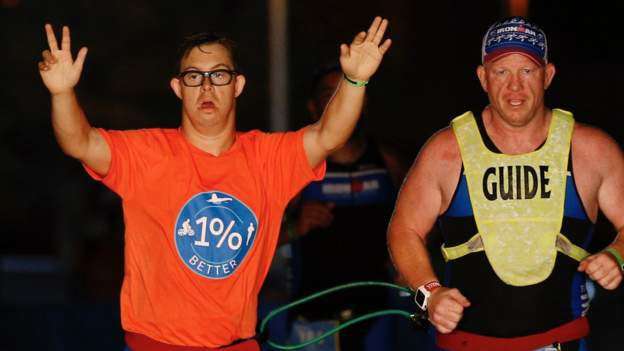 image for Chris Nikic becomes first person with Down's syndrome to finish an Ironman triathlon