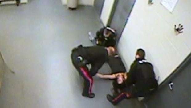 image for Video showing woman knocked out, dragged to RCMP cell prompts lawsuit, call for investigation