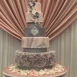 image for Once of the best wedding cakes I've seen my sister produce. She received an email this morning from the bride calling it "the ugliest part of her wedding". Along with some other nasty things. :(