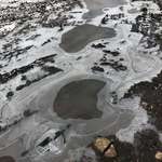 image for This frozen puddle looks like a landscape from the perspective of a plane