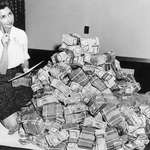image for This is a picture of my grandmother with 1 million dollars. She worked for city federal savings bank. Getty images now owns the picture. She passed away two days ago and I just wanted to show off my amazing Grandmother Marie Reed.