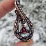 image for a pendant I made with copper wire, Garnet and Onyx