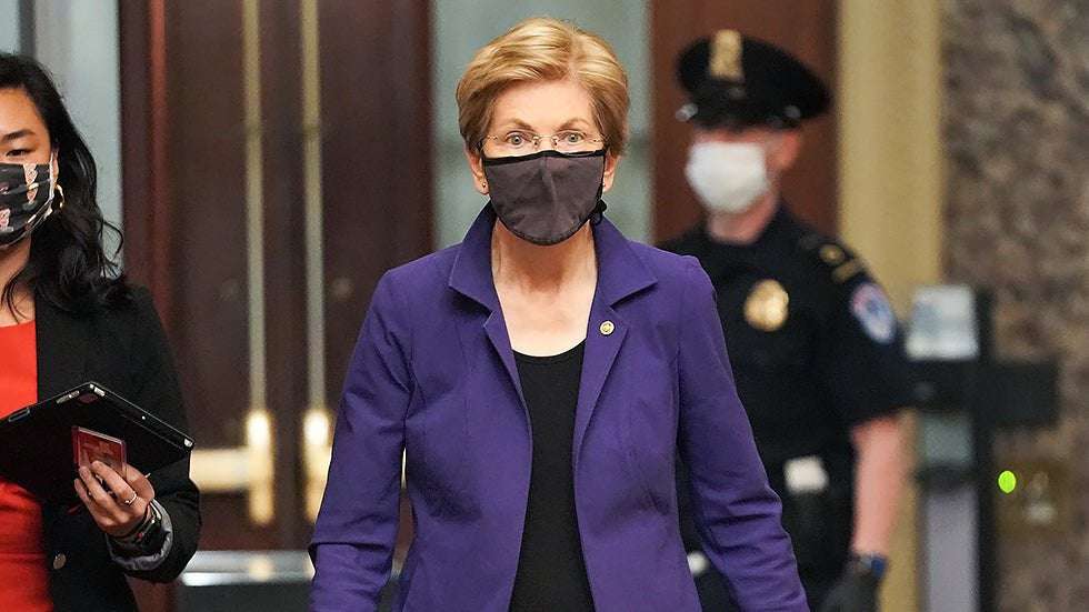 image for Warren reintroduces bill to bar lawmakers from trading stocks