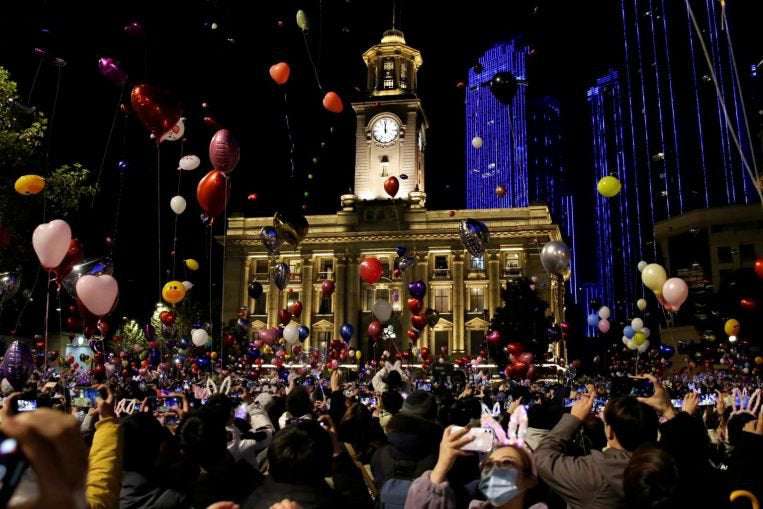 image for Crowds throng Wuhan, where coronavirus pandemic began, to celebrate New Year