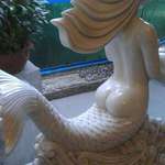 image for This mermaid statue has a human butt but a fish tail