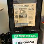 image for I have this Onion newspaper box with the last ever print issue still in the display window.