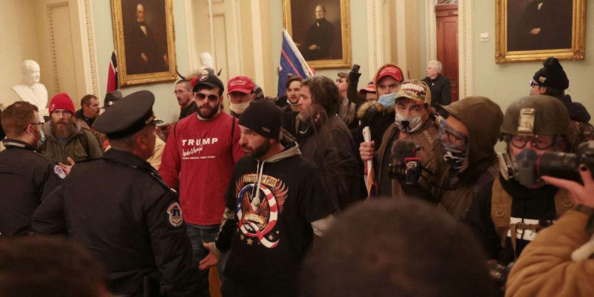 image for QAnon supporters believed marching on the Capitol could trigger 'The Storm,' an event where they hope Trump's foes will be punished in mass executions