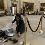 image for Rep. Andy Kim of New Jersey cleaning up the aftermath of the breach of the U.S. Capitol on Wednesday
